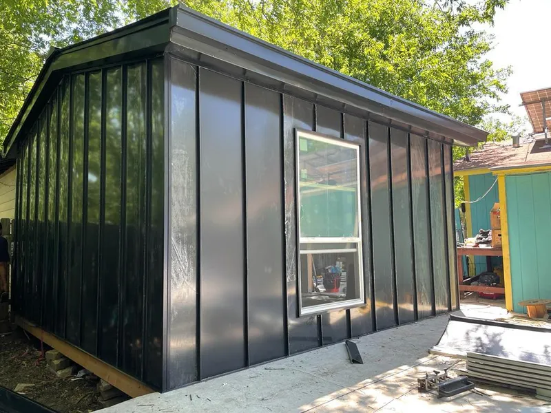 Black standing seam metal wall panels for Roof Inspection in North Lauderdale